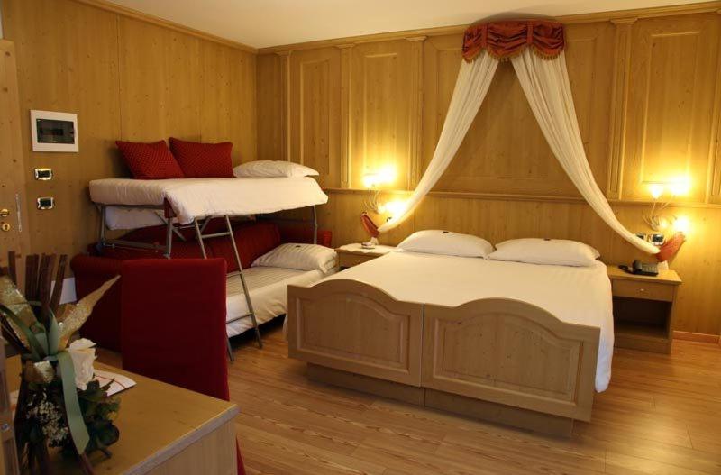 Hotel Gran Vacanze Rooms & Apartments Dimaro Habitación foto